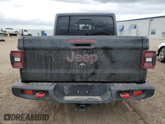 2023 Jeep Gladiator Rubicon with VIN 1C6JJTBG7PL573197, listed as a Copart auction lot 53866075 with 19,521 mi miles and Salvage title. Bid and sale history available at DreamBid. Image 6.