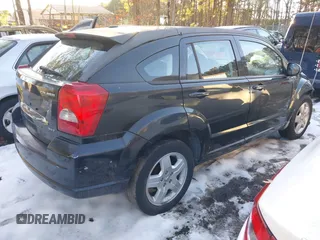2009 Dodge Caliber SXT with VIN 1B3HB48A89D118869, listed as a IAAI auction lot 41315552 with 198,986 mi miles and . Bid and sale history available at DreamBid. Image 4.