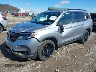 2021 Honda Pilot Special Edition with VIN 5FNYF6H20MB066095, listed as a IAAI auction lot 41863123 with 65,930 mi miles. Bid and sale history available at carsss.com. Image 2.