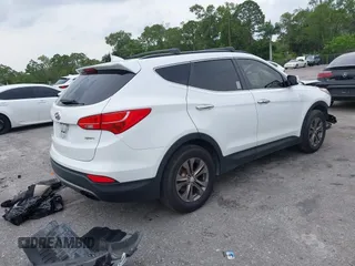 2014 Hyundai Santa Fe with VIN 5XYZU3LB9EG229255, listed as a IAAI auction lot 42407410 with 201,523 mi miles and . Bid and sale history available at DreamBid. Image 4.