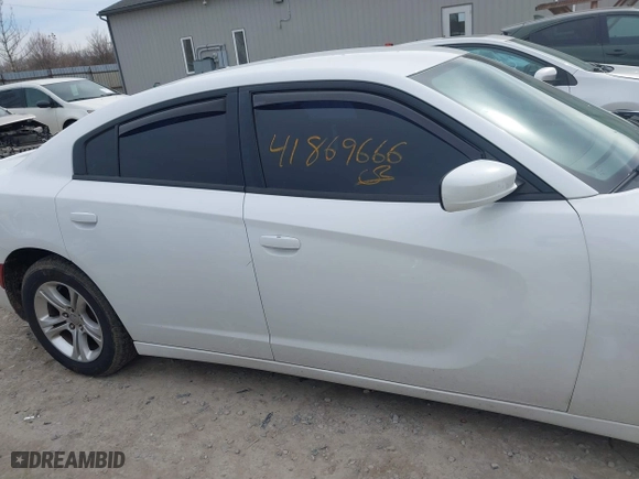 2015 Dodge Charger SE with VIN 2C3CDXBGXFH812015, listed as a IAAI auction lot 41869666 with 108,823 mi miles. Bid and sale history available at carsss.com. Image 13.