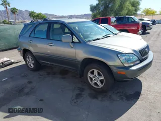 2001 Lexus RX 300 with VIN JTJGF10U710086704, listed as a IAAI auction lot 42183875 with 221,612 mi miles and . Bid and sale history available at DreamBid. Image 1.