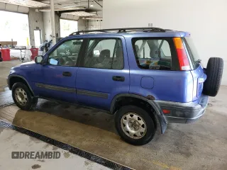 2001 Honda CR-V LX z VIN JHLRD18401C034127, wystawiony jako Copart lot #56577855 z przebiegiem 186 441 mil mil oraz Szkoda całkowita • Salvage title. Historia ofert i sprzedaży dostępna na DreamBid. Obrazek 2.