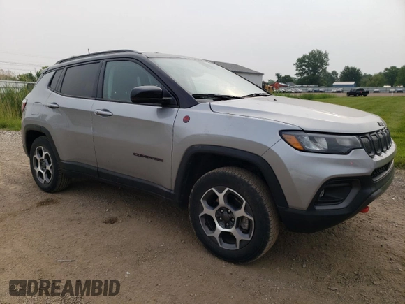 2022 Jeep Compass Trailhawk with VIN 3C4NJDDB7NT163504, listed as a Copart auction lot 60799975 with 16,312 mi miles and Salvage title. Bid and sale history available at DreamBid. Image 4.