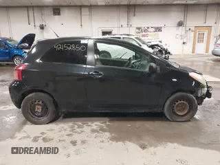 2008 Toyota Yaris with VIN JTDJT923285196299, listed as a IAAI auction lot 42152850 with 214,238 mi miles. Bid and sale history available at carsss.com. Image 15.