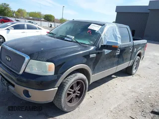 2006 Ford F-150 XLT with VIN 1FTPW12V26FB68613, listed as a IAAI auction lot 42065760 with 163,405 mi miles. Bid and sale history available at carsss.com. Image 2.