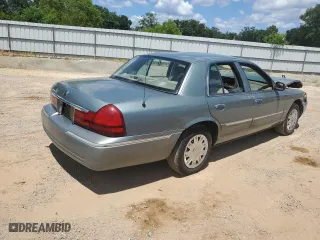 2005 Mercury Grand Marquis GS with VIN 2MEFM74W15X663557, listed as a Copart auction lot 65799904 with 107,483 mi miles and Salvage Title. Bid and sale history available at carsss.com. Image 3.