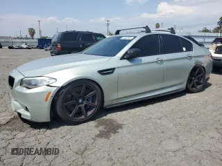 2013 BMW M5 z VIN WBSFV9C56DC774094, wystawiony jako Copart lot #55302565 z przebiegiem 100 605 mil mil oraz Tytuł czysty. Historia ofert i sprzedaży dostępna na DreamBid. Obrazek 1.