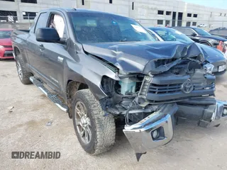 2014 Toyota Tundra SR with VIN 5TFRY5F19EX147624, listed as a IAAI auction lot 42615786 with 144,424 mi miles and . Bid and sale history available at DreamBid. Image 1.