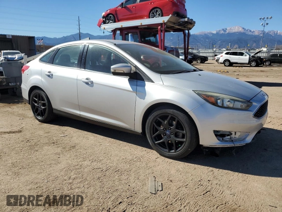 2016 Ford Focus SE with VIN 1FADP3F29GL314719, listed as a Copart auction lot 77686334 with 76,515 mi miles and Salvage title. Bid and sale history available at DreamBid. Image 4.