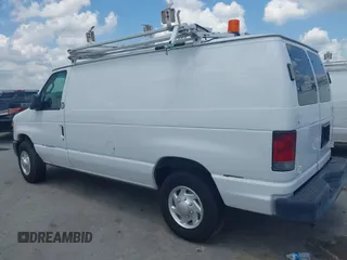 2011 Ford Econoline Cargo Commercial with VIN 1FTNE2EL4BDA70800, listed as a IAAI auction lot 42523533 with 139,962 mi miles and . Bid and sale history available at DreamBid. Image 14.