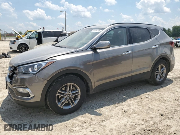 2018 Hyundai Santa Fe 2.4L with VIN 5XYZU3LB9JG563893, listed as a Copart auction lot 62058745 with 141,353 mi miles and Salvage title. Bid and sale history available at DreamBid. Image 1.
