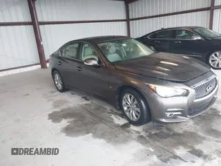 2015 Infiniti Q50 Premium z VIN JN1BV7AR0FM393387, wystawiony jako IAAI lot #42257850 z przebiegiem 176 436 mil mil oraz . Historia ofert i sprzedaży dostępna na DreamBid. Obrazek 1.