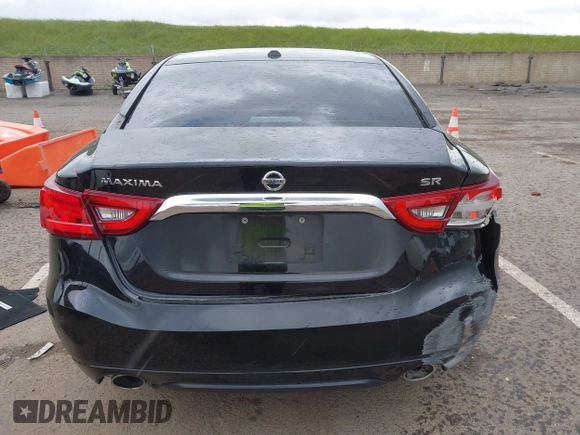 2016 Nissan Maxima SV z VIN 1N4AA6AP8GC408857, wystawiony jako IAAI lot #41892425 z przebiegiem 185 487 mil mil oraz . Historia ofert i sprzedaży dostępna na DreamBid. Obrazek 17.