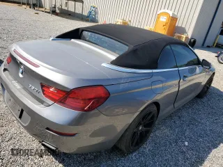 2012 BMW 6 Series z VIN WBALZ5C50CDW99700, wystawiony jako Copart lot #54983705 z przebiegiem Nie podano mil oraz Tytuł czysty. Historia ofert i sprzedaży dostępna na DreamBid. Obrazek 3.