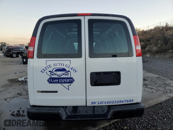 2021 Chevrolet Express Cargo with VIN 1GCWGBFP0M1206747, listed as a Copart auction lot 82701894 with Not provided miles and Salvage title. Bid and sale history available at DreamBid. Image 6.
