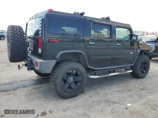 2006 Hummer H2 with VIN 5GRGN23U26H100264, listed as a Copart auction lot 58083494 with 169,104 mi miles and Salvage Title. Bid and sale history available at carsss.com. Image 3.