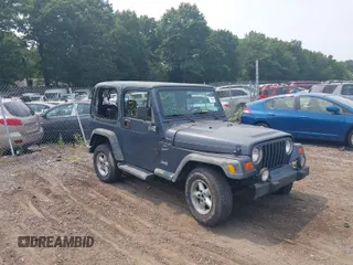 2001 Jeep Wrangler Sport with VIN 1J4FA49S91P330175, listed as a IAAI auction lot 40133432 with 999,999 mi miles. Bid and sale history available at carsss.com. Image 1.
