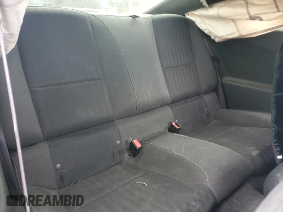 2013 Chevrolet Camaro LS z VIN 2G1FE1E35D9152655, wystawiony jako Copart lot #51190965 z przebiegiem Nie podano mil oraz Szkoda całkowita • Salvage title. Historia ofert i sprzedaży dostępna na DreamBid. Obrazek 10.
