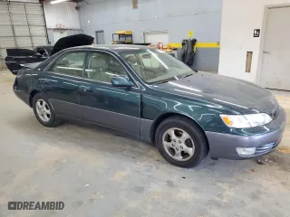 1997 Lexus ES 300 Luxury Sport Sdn with VIN JT8BF22GXV0010912, listed as a Copart auction lot 74691214 with 111,733 mi miles and Salvage Title. Bid and sale history available at carsss.com. Image 4.