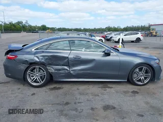 2018 Mercedes-Benz E 400 with VIN WDD1J6FB9JF015064, listed as a IAAI auction lot 42165914 with 95,290 mi miles and . Bid and sale history available at DreamBid. Image 14.