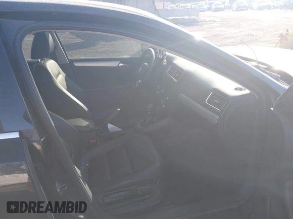 2013 Volkswagen Jetta Sedan SE w/Convenience/Sunroof with VIN 3VWBP7AJ1DM402355, listed as a IAAI auction lot 41402360 with 146,272 mi miles. Bid and sale history available at carsss.com. Image 5.