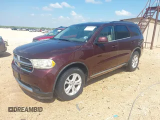 2012 Dodge Durango SXT with VIN 1C4RDHAG8CC361176, listed as a IAAI auction lot 42643631 with 201,419 mi miles and . Bid and sale history available at DreamBid. Image 2.