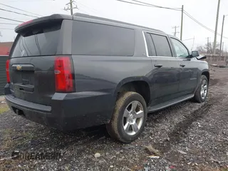 2016 Chevrolet Suburban LS with VIN 1GNSKGKC8GR416555, listed as a IAAI auction lot 41230592 with 140,549 mi miles. Bid and sale history available at carsss.com. Image 4.