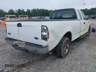 2001 Ford F-150 XL z VIN 1FTRX17L11NB54097, wystawiony jako IAAI lot #42353176 z przebiegiem 258 729 mil mil oraz . Historia ofert i sprzedaży dostępna na DreamBid. Obrazek 4.