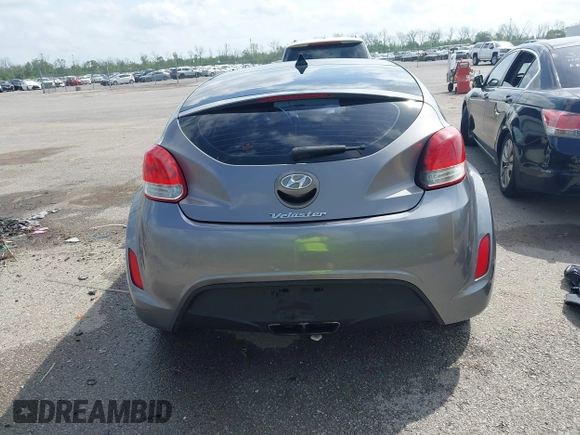 2013 Hyundai Veloster w/Black Int with VIN KMHTC6AD6DU169765, listed as a IAAI auction lot 41928516 with 130,708 mi miles and . Bid and sale history available at DreamBid. Image 16.