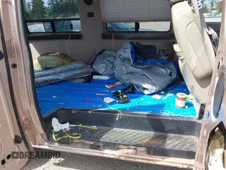 1996 Ford Econoline Cargo z VIN 1FDEE14H4THA09346, wystawiony jako IAAI lot #42108855 z przebiegiem 150 061 mil mil oraz . Historia ofert i sprzedaży dostępna na DreamBid. Obrazek 8.