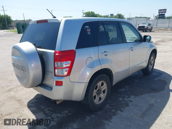 2012 Suzuki Grand Vitara Premium with VIN JS3TD0D29C4100982, listed as a IAAI auction lot 42645440 with 181,033 mi miles and . Bid and sale history available at DreamBid. Image 4.