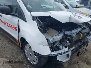 2022 Ford Transit Connect XL z VIN NM0LS7S2XN1519005, wystawiony jako IAAI lot #41944474 z przebiegiem 69 506 mil mil oraz . Historia ofert i sprzedaży dostępna na DreamBid. Obrazek 6.