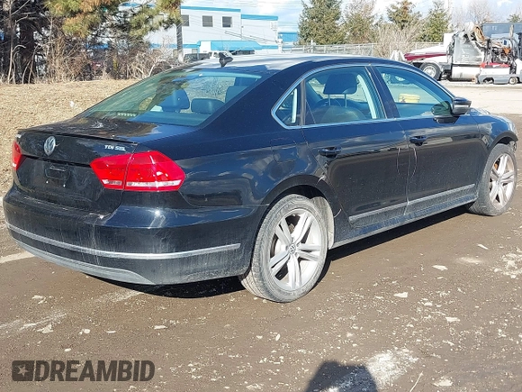 2014 Volkswagen Passat TDI SEL Premium with VIN 1VWCN7A33EC092174, listed as a IAAI auction lot 41690739 with 141,095 mi miles. Bid and sale history available at carsss.com. Image 4.