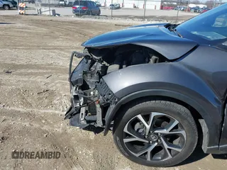 2018 Toyota C-HR XLE z VIN NMTKHMBX5JR042941, wystawiony jako IAAI lot #41803153 z przebiegiem 110 220 mil mil oraz . Historia ofert i sprzedaży dostępna na DreamBid. Obrazek 17.
