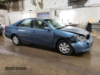 2004 Toyota Camry LE with VIN 4T1BE32K64U812388, listed as a Copart auction lot 82777563 with 209,219 mi miles and Clean Title. Bid and sale history available at carsss.com. Image 4.