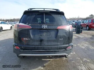 2016 Toyota RAV4 XLE with VIN 2T3WFREV7GW255784, listed as a IAAI auction lot 41266085 with 87,426 mi miles. Bid and sale history available at carsss.com. Image 16.