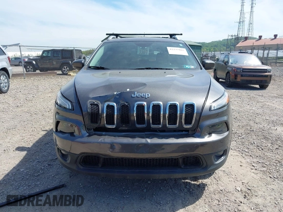 2018 Jeep Cherokee Latitude Plus z VIN 1C4PJMLX5JD603290, wystawiony jako IAAI lot #42237865 z przebiegiem 89 516 mil mil oraz . Historia ofert i sprzedaży dostępna na DreamBid. Obrazek 13.