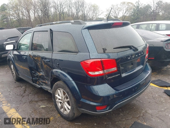 2014 Dodge Journey SXT with VIN 3C4PDCBB4ET245932, listed as a IAAI auction lot 41857444 with 228,827 mi miles. Bid and sale history available at carsss.com. Image 3.