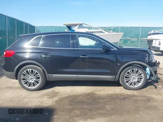 2016 Lincoln MKX Reserve with VIN 2LMTJ8LRXGBL79973, listed as a IAAI auction lot 41772136 with 105,566 mi miles. Bid and sale history available at carsss.com. Image 13.