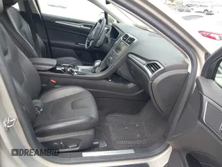 2015 Ford Fusion Titanium with VIN 3FA6P0K96FR180181, listed as a IAAI auction lot 41940248 with 63,120 mi miles. Bid and sale history available at carsss.com. Image 5.