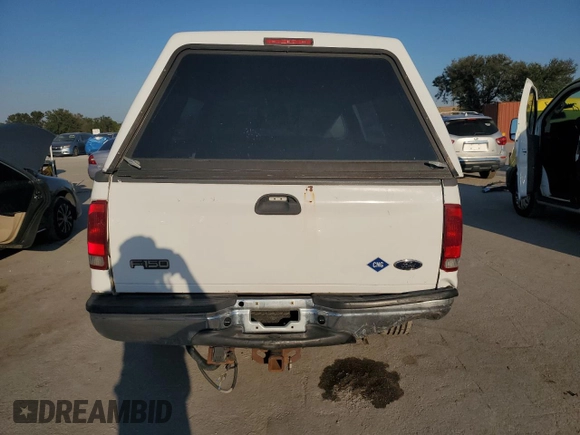 2003 Ford Super Duty F-250 XL with VIN 1FTNX21PX3ED46217, listed as a Copart auction lot 75094734 with 285,147 mi miles and Salvage Title. Bid and sale history available at carsss.com. Image 6.
