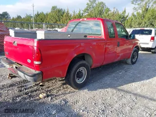 2000 Ford Super Duty F-250 XL with VIN 1FTNX20S9YEE22832, listed as a IAAI auction lot 41631143 with 197,448 mi miles. Bid and sale history available at carsss.com. Image 4.