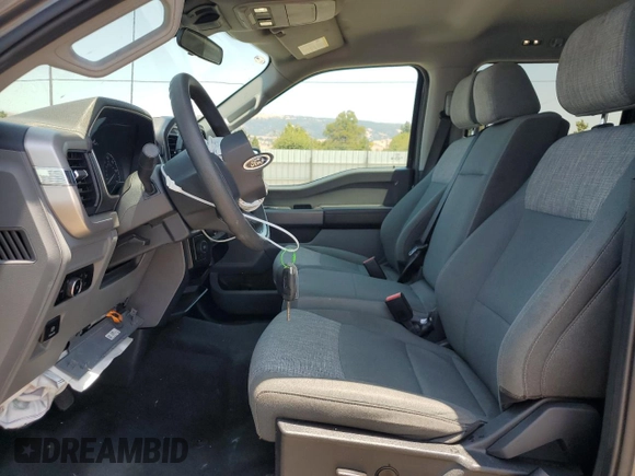 2023 Ford F-150 XL with VIN 1FTEW1C83PKE77757, listed as a Copart auction lot 60327855 with 42,728 mi miles and Clean title. Bid and sale history available at DreamBid. Image 7.