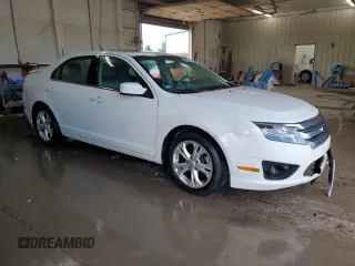 2012 Ford Fusion SE with VIN 3FAHP0HA5CR427017, listed as a Copart auction lot 64191425 with 211,924 mi miles and Salvage title. Bid and sale history available at DreamBid. Image 4.