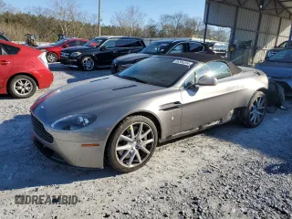 2014 Aston Martin Vantage z VIN SCFEKBBK3EGD18661, wystawiony jako Copart lot #86366204 z przebiegiem 14 863 mil mil oraz Szkoda całkowita • Salvage title. Historia ofert i sprzedaży dostępna na DreamBid. Obrazek 1.