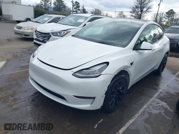 2022 Tesla Model Y Long Range with VIN 7SAYGDEE6NF461788, listed as a IAAI auction lot 41697064 with 34,034 mi miles and . Bid and sale history available at carsss.com. Image 18.
