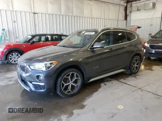 2018 BMW X1 xDrive28i z VIN WBXHT3C31J5K26279, wystawiony jako Copart lot #56600425 z przebiegiem 70 190 mil mil oraz Czysty tytuł • Clean title. Historia ofert i sprzedaży dostępna na DreamBid. Obrazek 1.