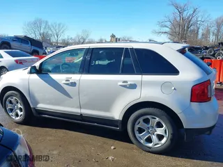 2012 Ford Edge SEL with VIN 2FMDK3J96CBA91381, listed as a IAAI auction lot 41355115 with 148,213 mi miles. Bid and sale history available at carsss.com. Image 14.