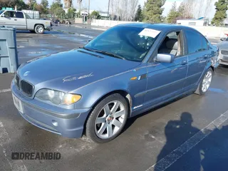 2002 BMW 3 Series 325i with VIN WBAET374X2NG72824, listed as a IAAI auction lot 41822437 with 1 mi miles. Bid and sale history available at carsss.com. Image 2.